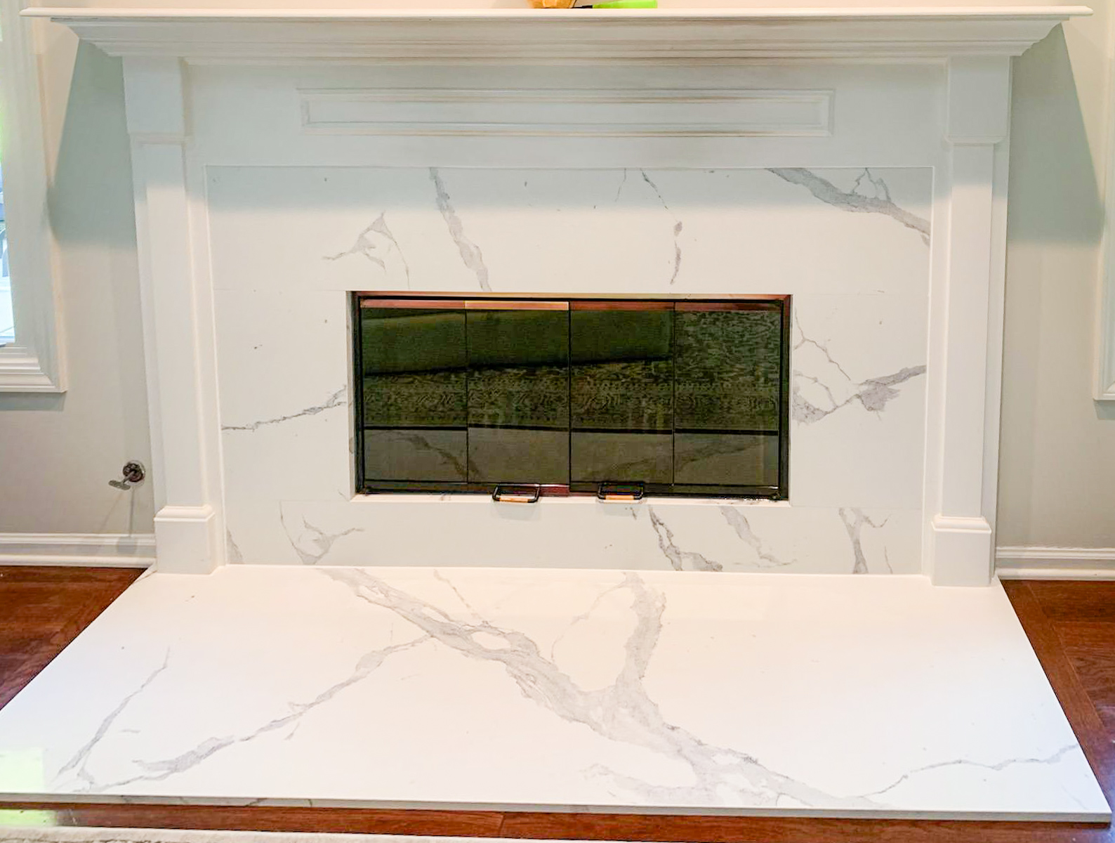 Elegant Fireplace Refacing with Statuario Quartz in Crystal Lake, IL
