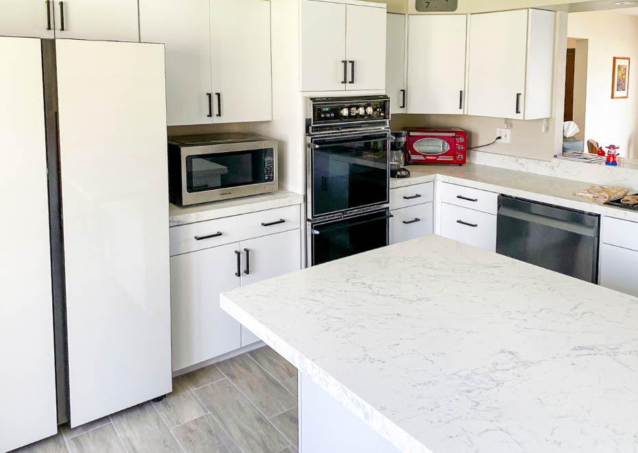 Cary, IL Kitchen Transformation: White Slab Doors & Luxurious Carrara Countertops